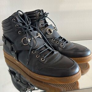 Gucci leather boots with gum sole